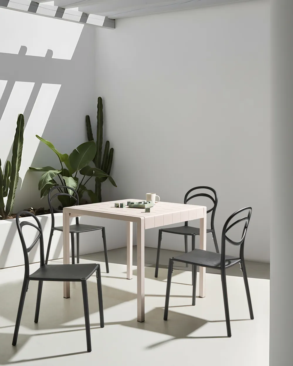 Set of 4 Garden Chairs COVOLO Black